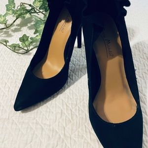 Black pointed toed heels with ankle detail. Only wore once.